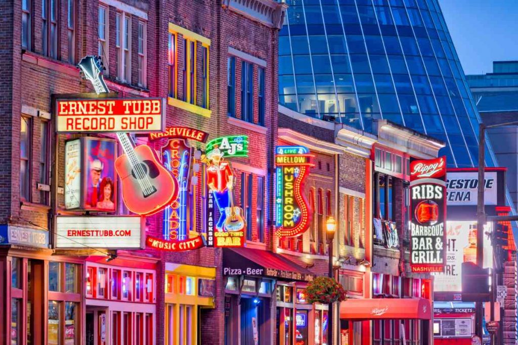Views of downtown Nashville with storefront lights for a girl's weekend destination.