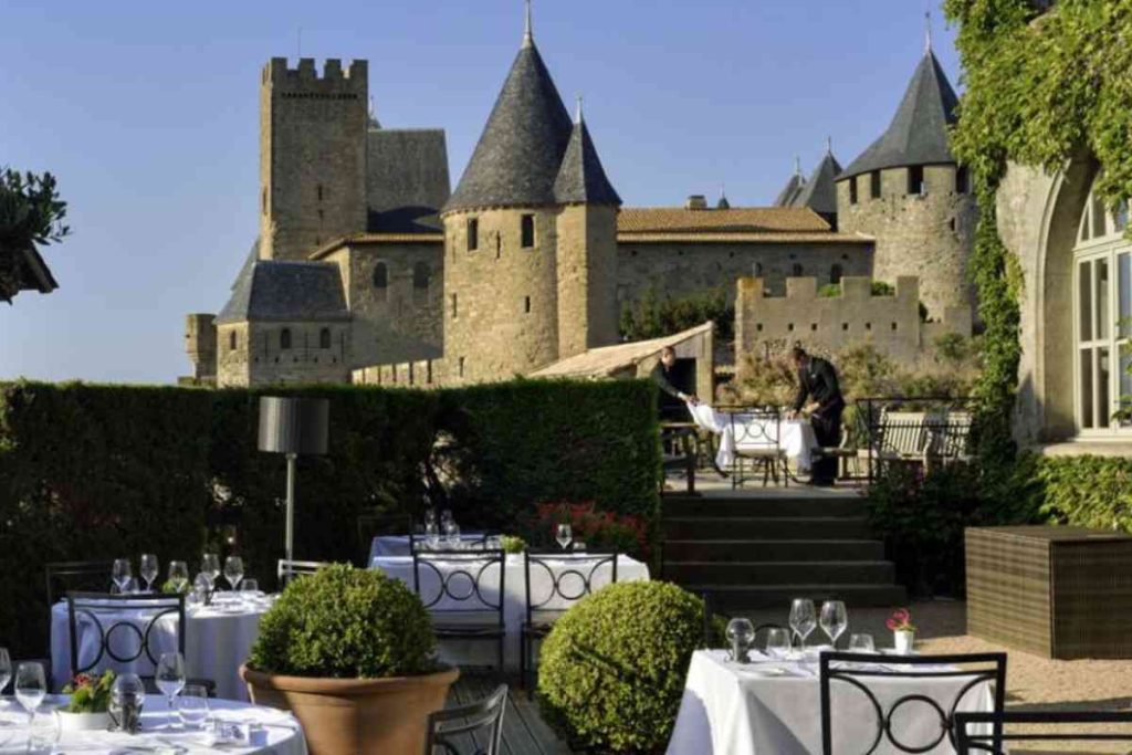 View of a patio set up in the Hôtel de la Cité, France.